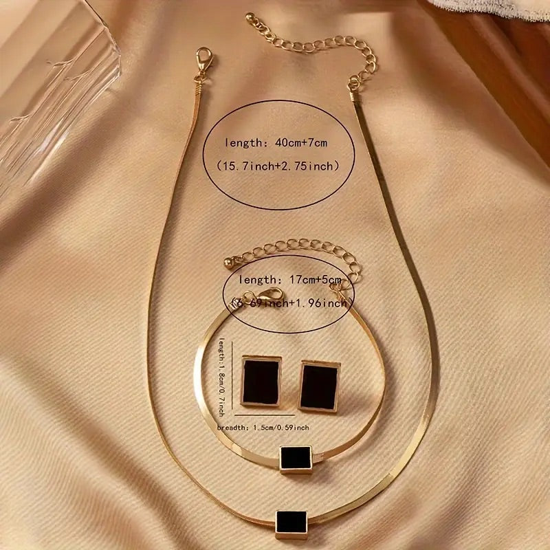 Halsband med en droppe-hänge och armband med en droppe-hänge i set med örhängen